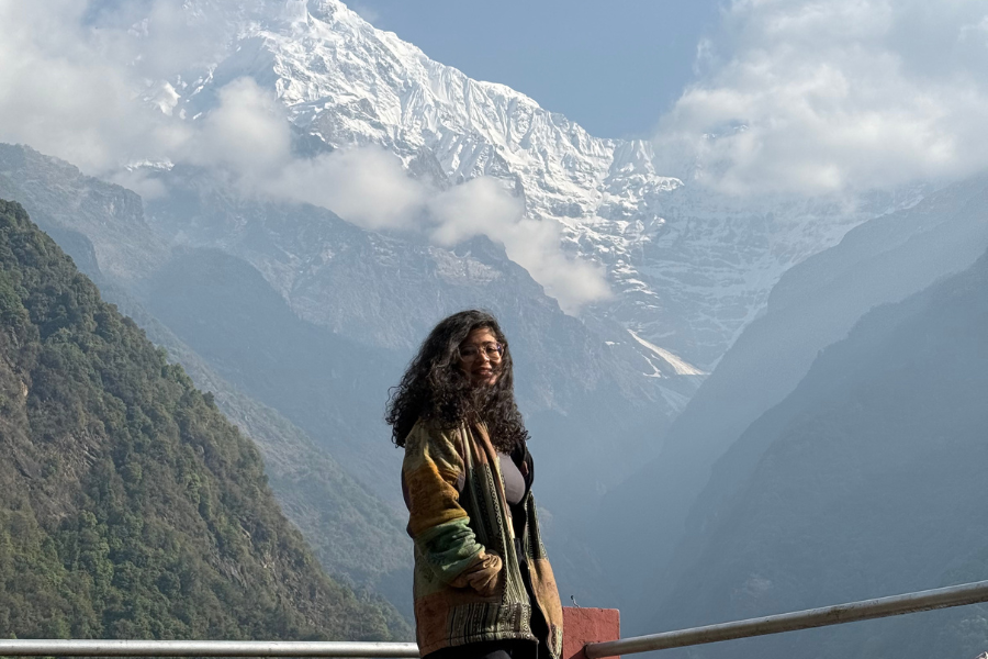 Girl posing in front of Annapurna Base Camp trek Girl posing in front of Annapurna Base Camp trek